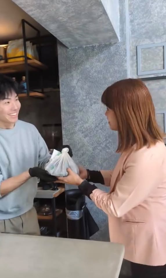 Collecting spent coffee grounds from a local café